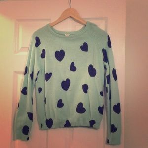 Mint green sweater with black hearts.  Worn once!